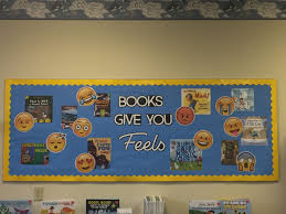 Emoji Bulletin Board Library Display Seneca East Public Library Books Give You Fe Reading Bulletin Boards Middle School Emoji Bulletin Board Emoji Classroom