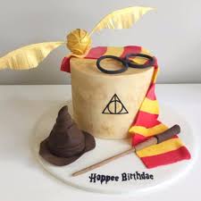 White Fondant Covered One Tier Cake Happy Birthday Harry Potter Cake Snitch Glasses Gryffind Harry Potter Birthday Cake Harry Potter Cake Harry Potter Birthday