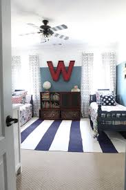 When two siblings share the same interest, they can turn a small bedroom into a creative hub for diy projects and use their furniture in different ways. The Big Boy Room Reveal Bower Power Shared Boys Rooms Big Boy Bedrooms Big Boy Room