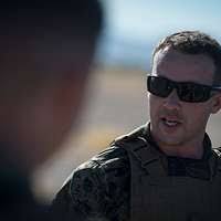 U.S. Marine Corps Maj. Justin Huber supervises U.S.