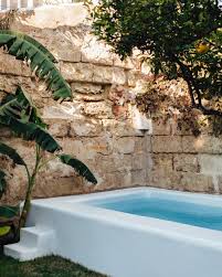 Casa Mina S Garden Is Like An Oasis In The Centre Of Mahon Wishewewerethere Casamina Quintanapar In 2020 Mediterranean Style Homes House Designs Exterior Pool Patio