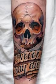 The sword has taken many lives over the years it has been in existence. Traditional Skull Tattoo With Sword And Banner On Arm