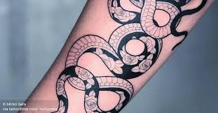 Black and grey floral snake tattoo on the forearm. Flower Snake Tattoo On The Forearm