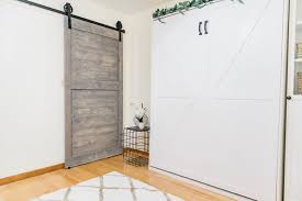 10 tricks to maximize space and style. Guest Room Makeover With Diy Sliding Barn Door And Murphy Bed Tampa Mom Blog