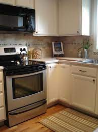 Maybe you would like to learn more about one of these? Pin By Candice Startzman On Our First Home Painting Fake Wood Old Kitchen Cabinets Kitchen Diy Makeover