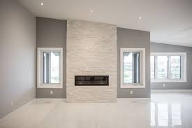 Clean Looking Fireplace With White Stone From Floor To Ceiling White Stone Fireplaces Fireplace Design Fireplace
