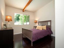 Perhaps the room that most reflects our personality is the bedroom. White Bedroom With Dark Wood Floors Hgtv