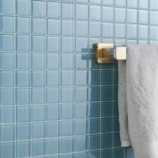 It's not a very good idea to use meter long, gigantic tiles in most small bathrooms because the tile will get cut off a lot; Loft Blue Gray 2x2 Polished Glass Tile Tilebar Com