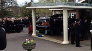 Kath rathband (centre), the widow of pc david rathband, attends his funeral (pic: Pc Rathband Laid To Rest Tyne Tees Itv News