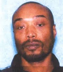 Man charged after woman's body found in Detroit trash bin