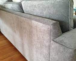 Asymmetrical sofa table decor with 1 lamp & 2 baskets. Length Height Of Console Table For Large Couch