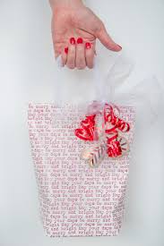 That is exactly how to seal a paper in the middle. How To Make A Gift Bag Out Of Wrapping Paper Everyday Laura