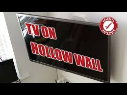 How To Wall Mount A Tv With No Studs Drywall Sheetrock Youtube Wall Mounted Tv Plasterboard Wall Mounted Tv