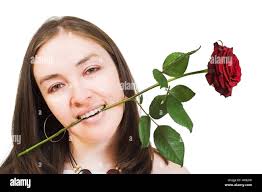 Woman rose in mouth hi-res stock photography and images