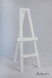 Display easels ensure a flawless presentation. White Wooden Easel Wooden Easel Beautiful Decor Decor