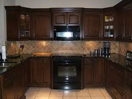brown kitchen cabinets with dark