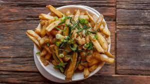 Learn how to make real poutine at home with my authentic canadian poutine recipe. Where To Eat Poutine Around The World Eat North