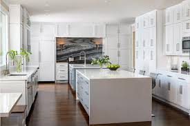 Whether you're looking to expand your counter space for food prep or need a little extra storage, kitchen islands are a chic and practical. White Chef Kitchen With Two Islands Hgtv