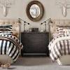 Upholstered headbord with a solid wood frame. 1