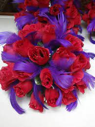 Purple and red do go together if you wear a lot of one and a little of the other so don't listen to the other guy he doesn't know fashion! Red Purple Centerpieces Could We Use Lace Or White Flowers Instead Of The Purple Red Hats Red Purple Red Hat Ladies