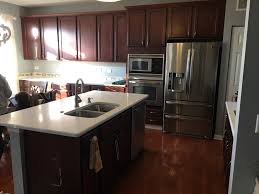 Don't start securing the countertop to the cabinets until the mitered joint has dried. Should I Paint My Cherry Cabinets D Franco Painting Wallpaper