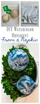 With a simple straw, you can poke a hole in the top and hang your hand print ornament with ribbon. Watercolor Christmas Ornament From A Napkin 2018 Ornament Exchange 2 Bees In A Pod