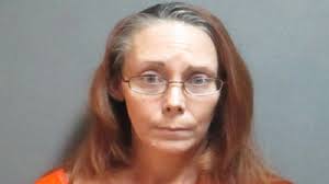 Texas woman accused of murdering, setting husband