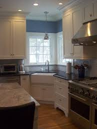 To install a worktop under the window, it is necessary to calculate the right height of the window sill and the position of the tap. New York Dutch Colonial Homes Kitchen Traditional With Corner Sink Windows And Bath Fixture Professionals