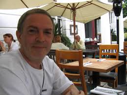 In principle, if a player is falling and the ball accidentally hits their  hand/arm when it is between their body and the ground, the referee allows  play to continue. It is not