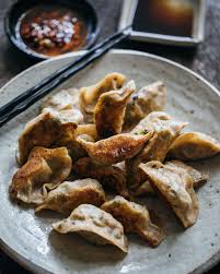 How To Make Vegetarian Potsticker Dumplings Adamliaw Com Vegetarian Dumpling Flavorful Vegetables Dumplings