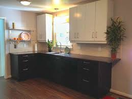 We ordered samples from several other ikea cabinet door companies, and the quality of the cabinet face's products really stood out. Miranda Had Selected Akurum Cabinets And Drawers With Gnosjo Door Panels In Black Foil Finish For The Wall Cabinets And W Kitchen Ikea Kitchen Base Cabinets