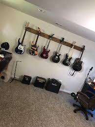Here's the making of an awesome, simple and minimalistic diy wall mounted guitar holder. Diy Guitar Wall Mount Showing Off Part Of The Collection Album On Imgur