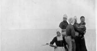 Volendam Women And Children Standing With Their Backs To The Zuider Zee