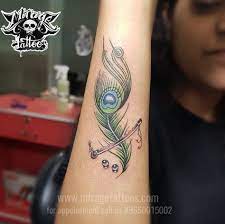 Peacock Feather Tattoo Flute Tattoo Peacockfeathertattoo Miragetattoos Tattoosbyashok Ta Tattoo Designs Wrist Feather Tattoo Design Rose Tattoos For Women