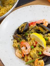 Add the garlic, paprika and sherry (if using), stirring for 1min. Seafood Paella Pinch Of Nom