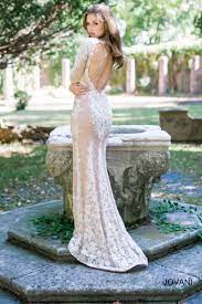 Long Sleeve Floor Length Lace Dress With A Gorgeous Open Back And Sweep Train See More Here Https Www Jovani Com Bridal Gowns Wedding Dresses Bridal Dresses