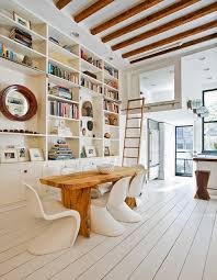 After sanding the floor, it's important to protect your hardwood floor by applying a sealant or stain. Painted Wood Floors