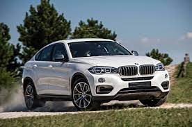Comparison Bmw X6 Xdrive50i 2015 Vs Toyota Highlander Hybrid Limited 2015 Suv Drive