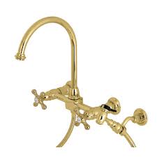 Delta magnatite® docking technology keeps the sprayer head locked in place. Kingston Brass Restoration 2 Handle Wall Mount Standard Kitchen Faucet With Side Sprayer In Polished Brass Hks1292axbs The Home Depot