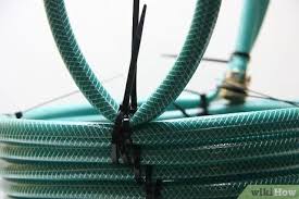 Position the hose's female coupling facing downward on the inside of the basket, at the point. 3 Ways To Make A Basket From A Garden Hose Wikihow