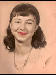 Can someone edit the photo to make her face brighter?