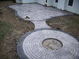 Decorative concrete applications are great for achieving a fully customized look. Pin By Deedra Stewart On Patio Deck Concrete Patio Backyard Fire Fire Pit Backyard