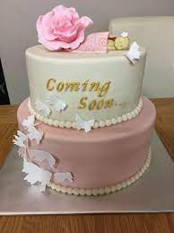 2 Tier Pink White And Gold Baby Shower Cake With Baby Rose And Butterflies Gold Baby Shower Cake Baby Shower Cakes Butterfly Baby Shower Theme