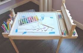 Design Ingenuity Diy Kids Craft Table Latt Hack With Paper Roll Holder Mounted Along Side Instead Of Underne Kids Art Table Kids Craft Tables Craft Table Diy