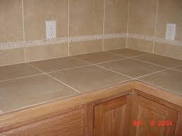 It's just a matter of weighing the pros and cons and deciding what look or style works with all your other outdoor kitchen design ideas. Countertop Backsplash Options Installing Granite Tile Counter Tops Specifically In The Kitchen Tile Countertops Kitchen Tile Countertops Kitchen Countertops