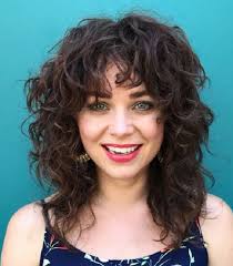 If you have extremely curly hair, the shortest bangs might be your best bet. 50 Hot And Wearable Medium Length Layered Hairstyles Cheeky Locks