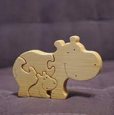 Maybe you would like to learn more about one of these? Wooden Puzzle Toy Hippo Mommy Baby Montessori Material Wood Etsy In 2021 Wood Animal Wooden Puzzles Wooden Animal Toys