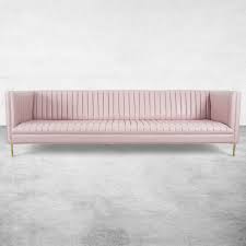 What are some of the most reviewed products in tufted sectional sofas? 007 Long Arm Tufted Sofa In Blush Pink Faux Leather Modshop