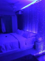 It has beige seats and a four poster bed that complements the wooden nightstands. The Room With Only Blue Lights Picture Of Le Domaine De L Orangeraie Resort Spa La Digue Island Tripadvisor