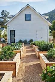 European farmhouse styles, including french, tuscan, and english, offer a lighter, airier take on the style. Farmhouse Vegetable Garden Vegetablegardening Farmhouse Landscaping Garden Beds Vegetable Garden Raised Beds